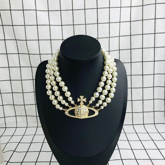 Vivienne Westwood Jewelry - NWT Vivienne Westwood Three Row Pearl Bas Relief Choker